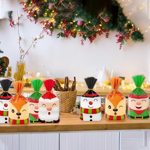 peony man 100 PCS Christmas Cellophane Treat Bags 5.1 x 9.1 Inch Christmas Plastic Candy Bag with Twist Ties 4 Styles Santa Claus Snowman Goodie Bags for Xmas Holiday Home Party Supplies