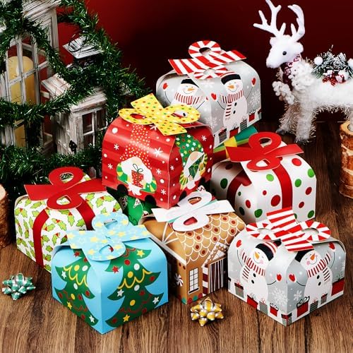 JOYIN 24 PCS 3D Christmas Goody Gift Boxes with Bow for Holiday Xmas Goodie Paper Boxes, School Classroom Party Favor Supply, 6” x 6” x 5.5” 8 Designs Candy Treat Cardboard Cookie Box for Gift Giving