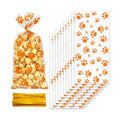 ZYLOP 100Pcs Dog Treat Bags - 5 x 11 Inch Clear Orange Dog Cellophane Treat Bags with 110 Gold Twist Ties for Pet Treats, Cookies & Candy, Paw Print Bags for Fall Parties and Party Favors